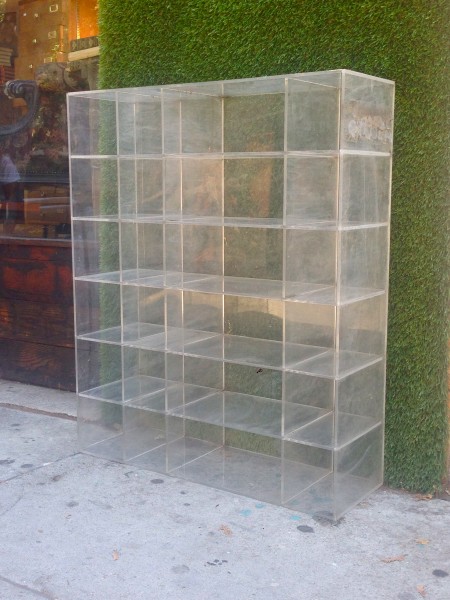 small lucite / plastic cubbie holder