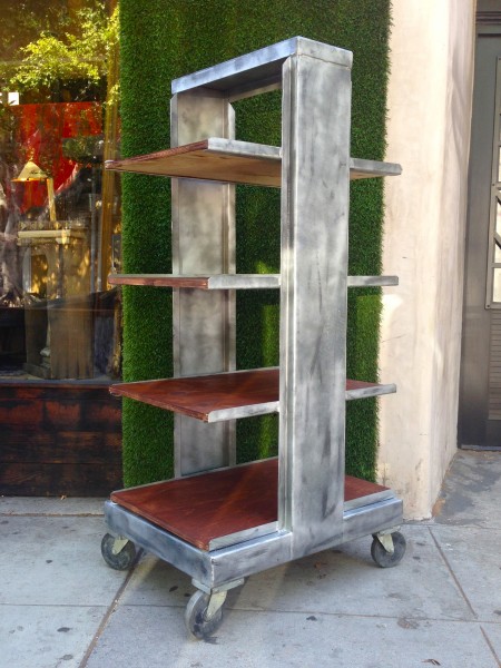 industrial shelving unit with plywood shelves & casters