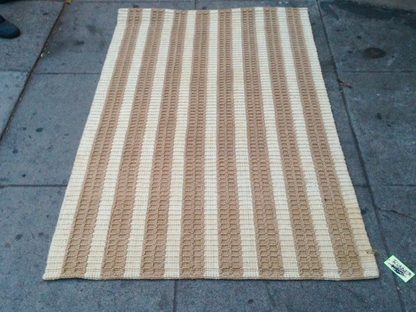 striped woven rug