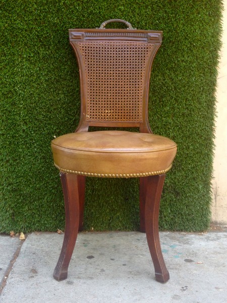 vintage chair with tufted seat