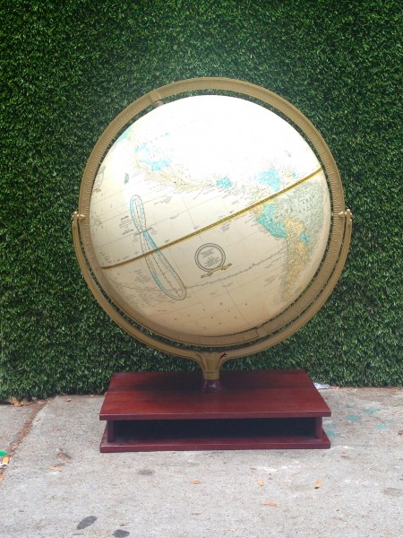 vintage globe on wooden stand