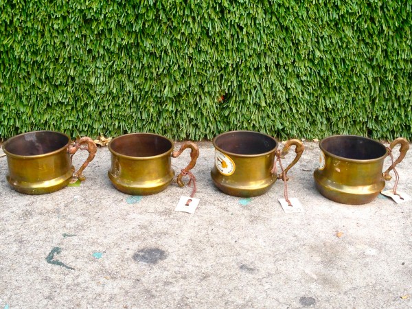 4 small brass cups