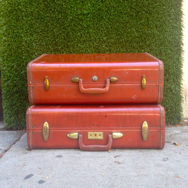 pair of leather vintage suitcases
