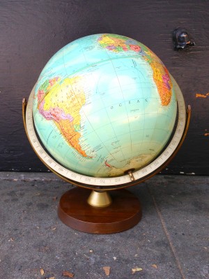 vintage globe with wooden stand