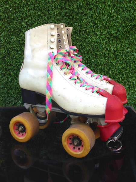 pair of vintage white roller skates