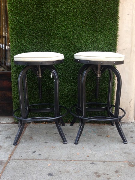 round adjustable metal stools with white cushion