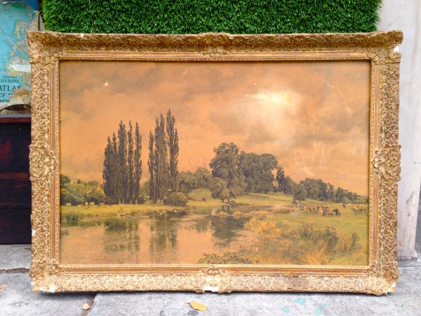 large framed landscape painting