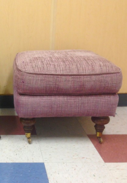 vintage pink ottoman on casters