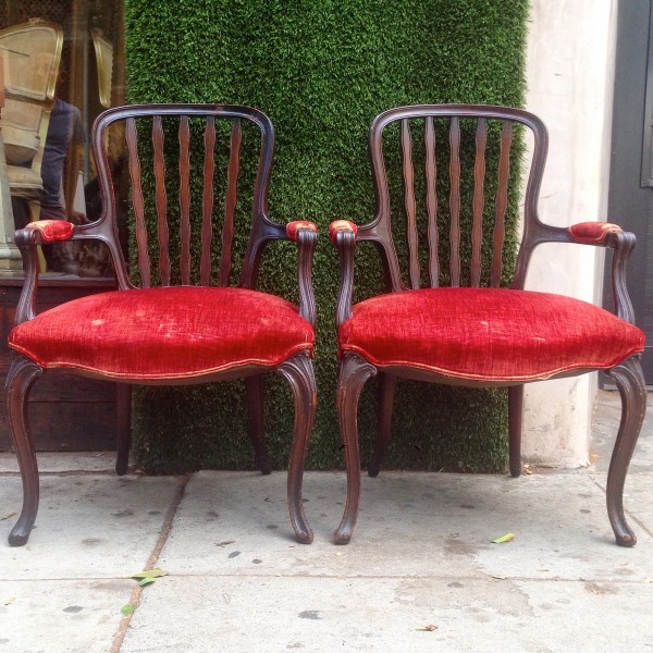 pair of vintage chairs with red upholstery