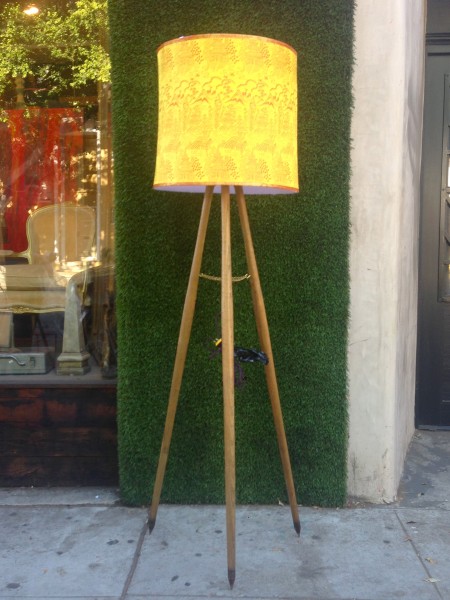 wooden tripod lamp with yellow shade