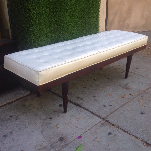 mid century bench with white vinyl