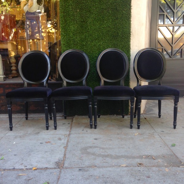 set of black hollywood regency chairs