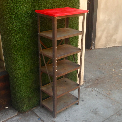 vintage iron shelf with red top