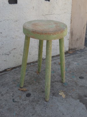 small wooden green vintage milking stool