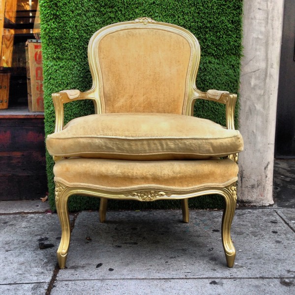 hollywood regency gold arm chair