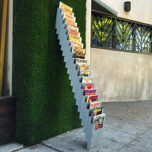 vintage staircase magazine stand