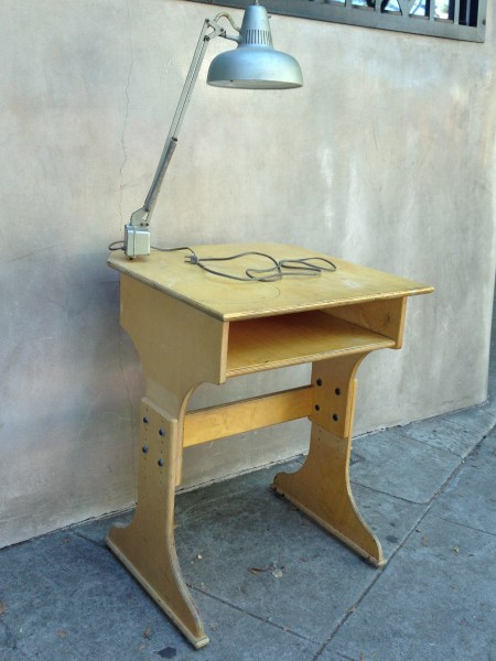 vintage wooden desk with lamp attached