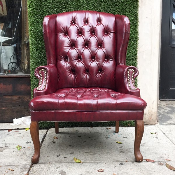 burgundy tufted smoking chair