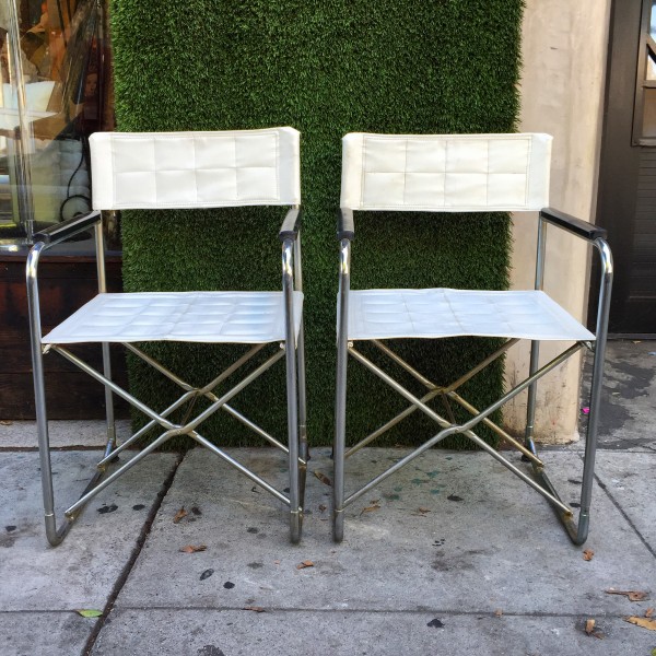pair of chrome and vinly accent chairs