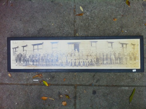 long 1928 cepia photograph with black frame