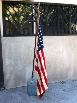vintage american flag on mast with eagle