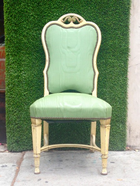chair with green vinyl upholstery