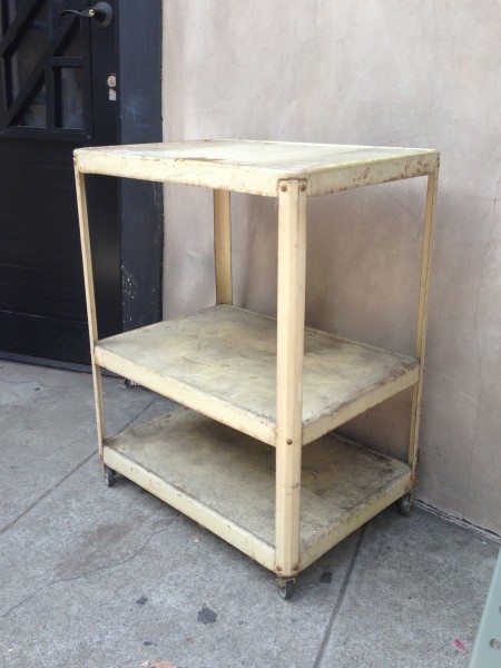 white industrial cart on casters