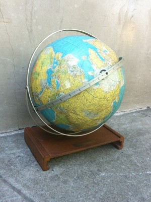 mid century globe with wooden stand