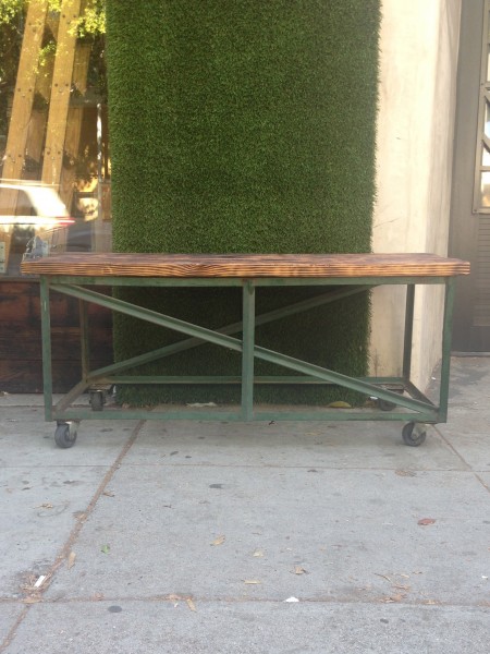 industrial table with wooden top & wheels