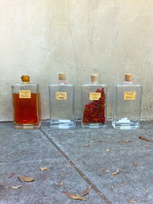 4 vintage glass square bottles