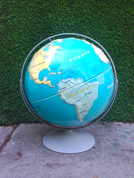 vintage globe on metal stand