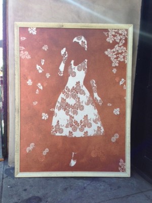 large abstract painting of woman with white dress